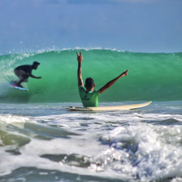 Advanced surfer on a barrel wave