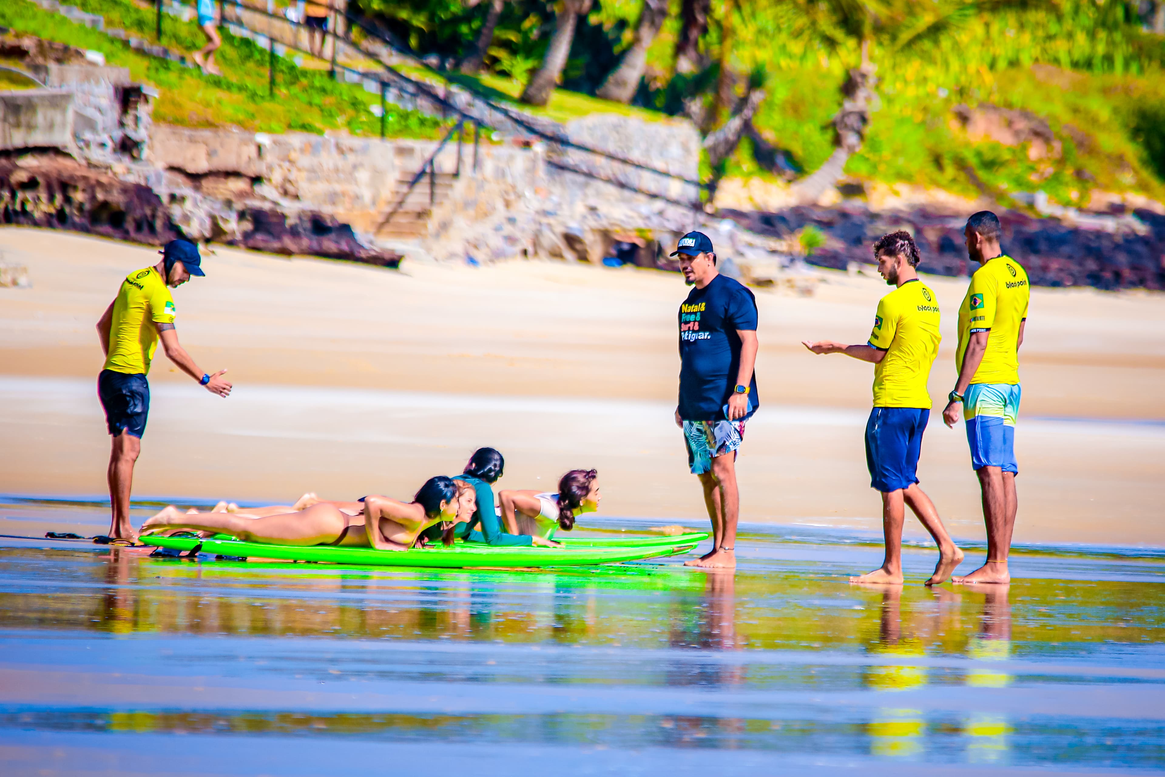 Surf instructor teaching on the beach
